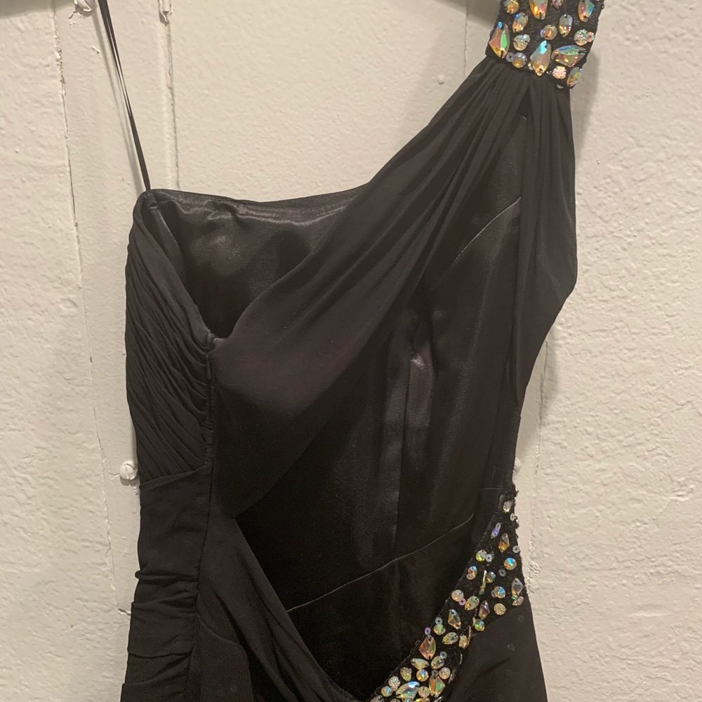 Black floor length dress.